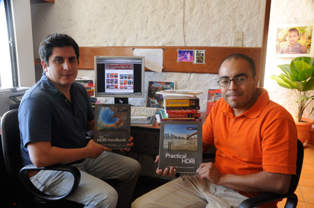 Eduardo and Luis, showing some books about Digital Photography.